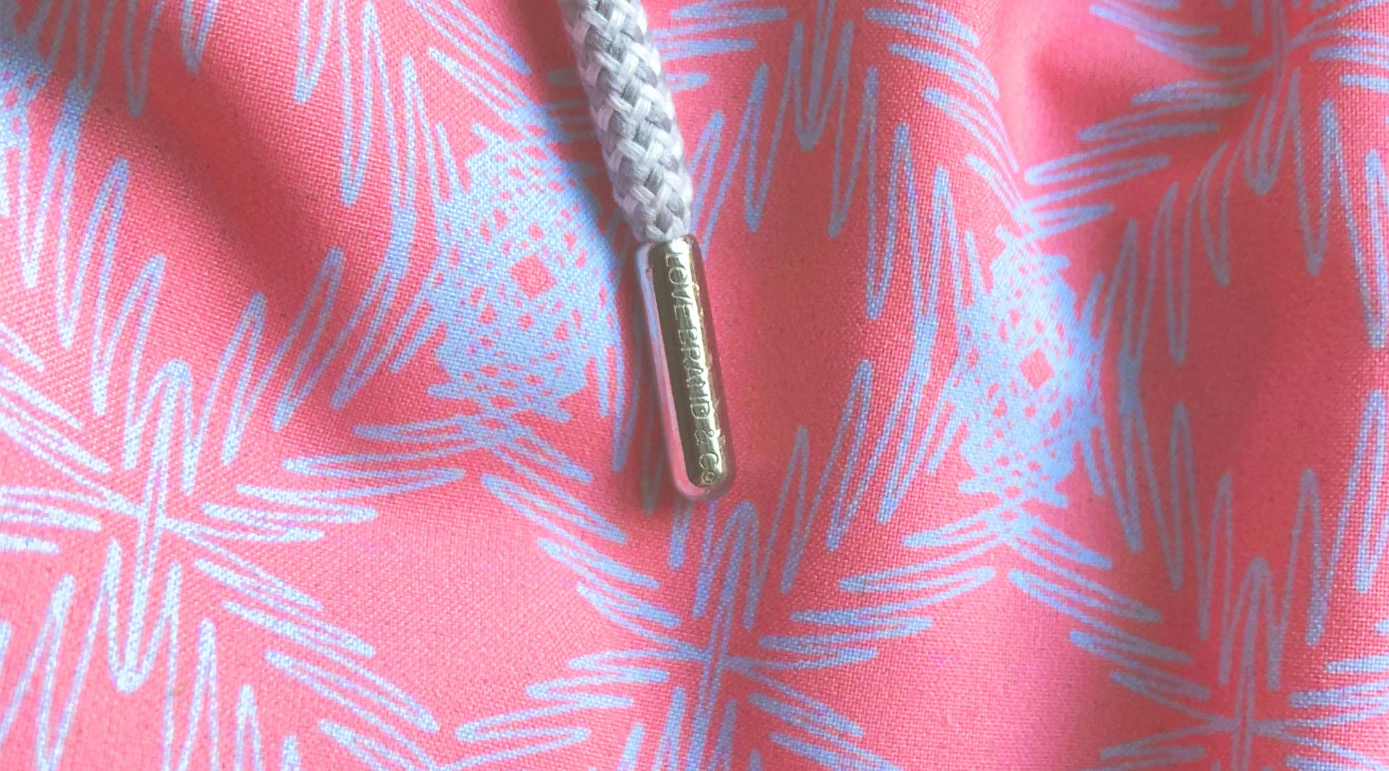 Palm profusion men's swim shorts close-up