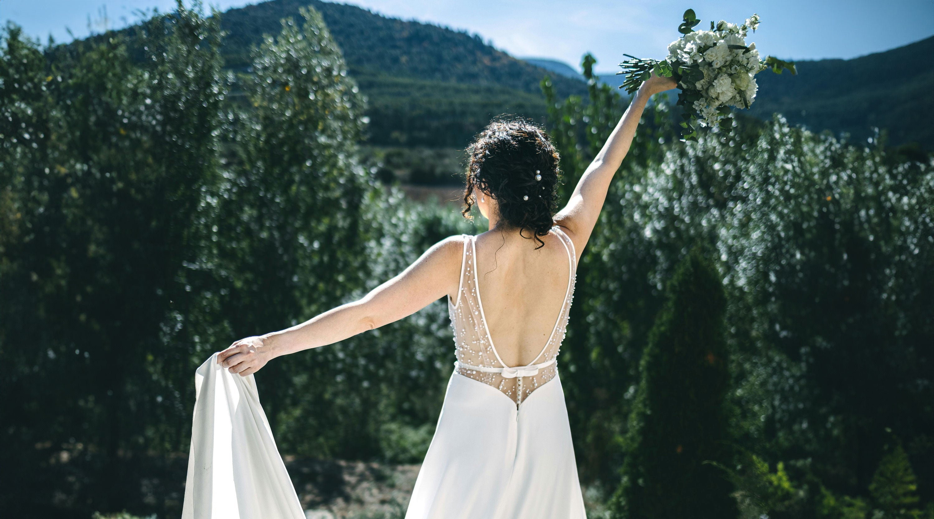 woman in wedding dress in summer
