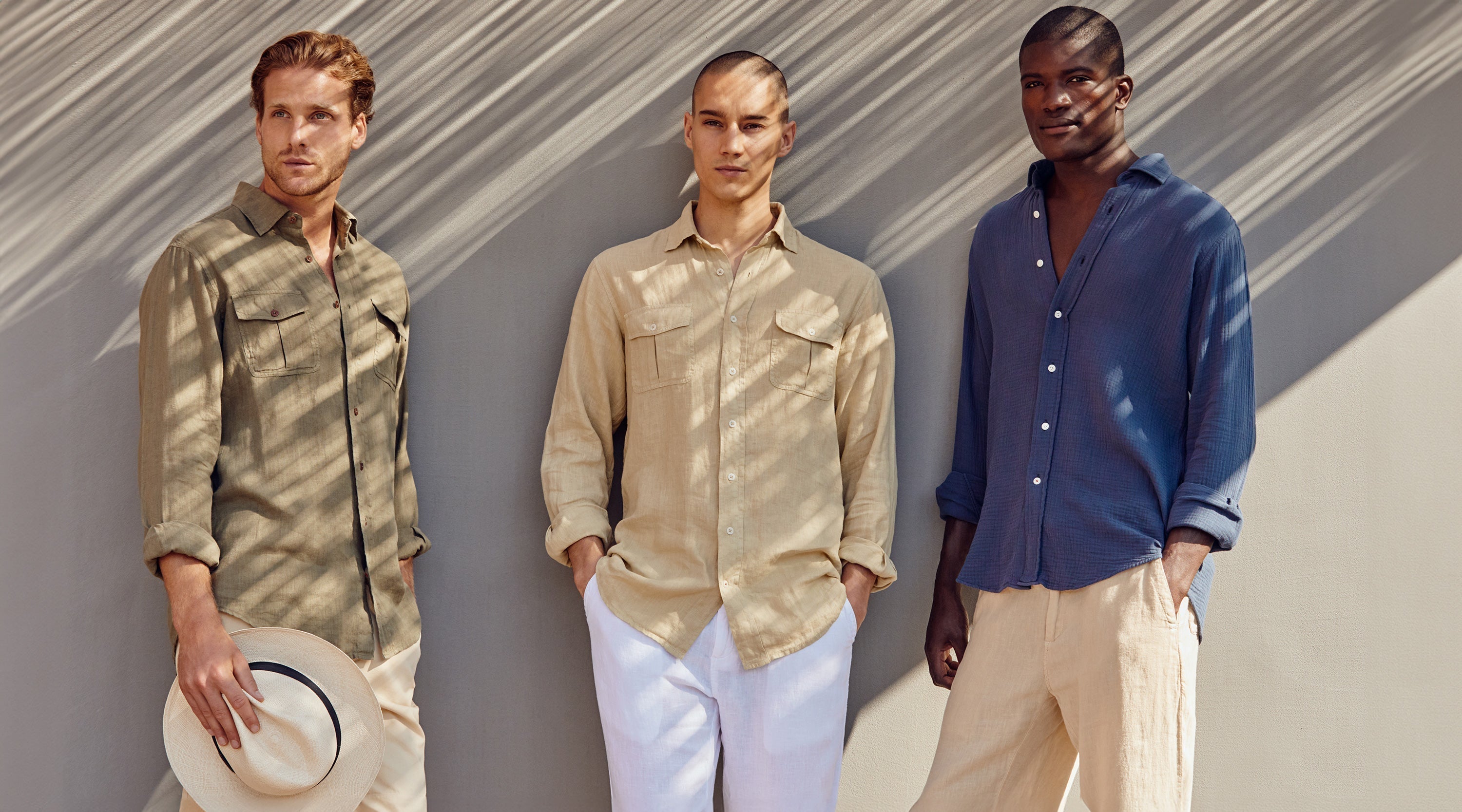Models wear men's linen trousers