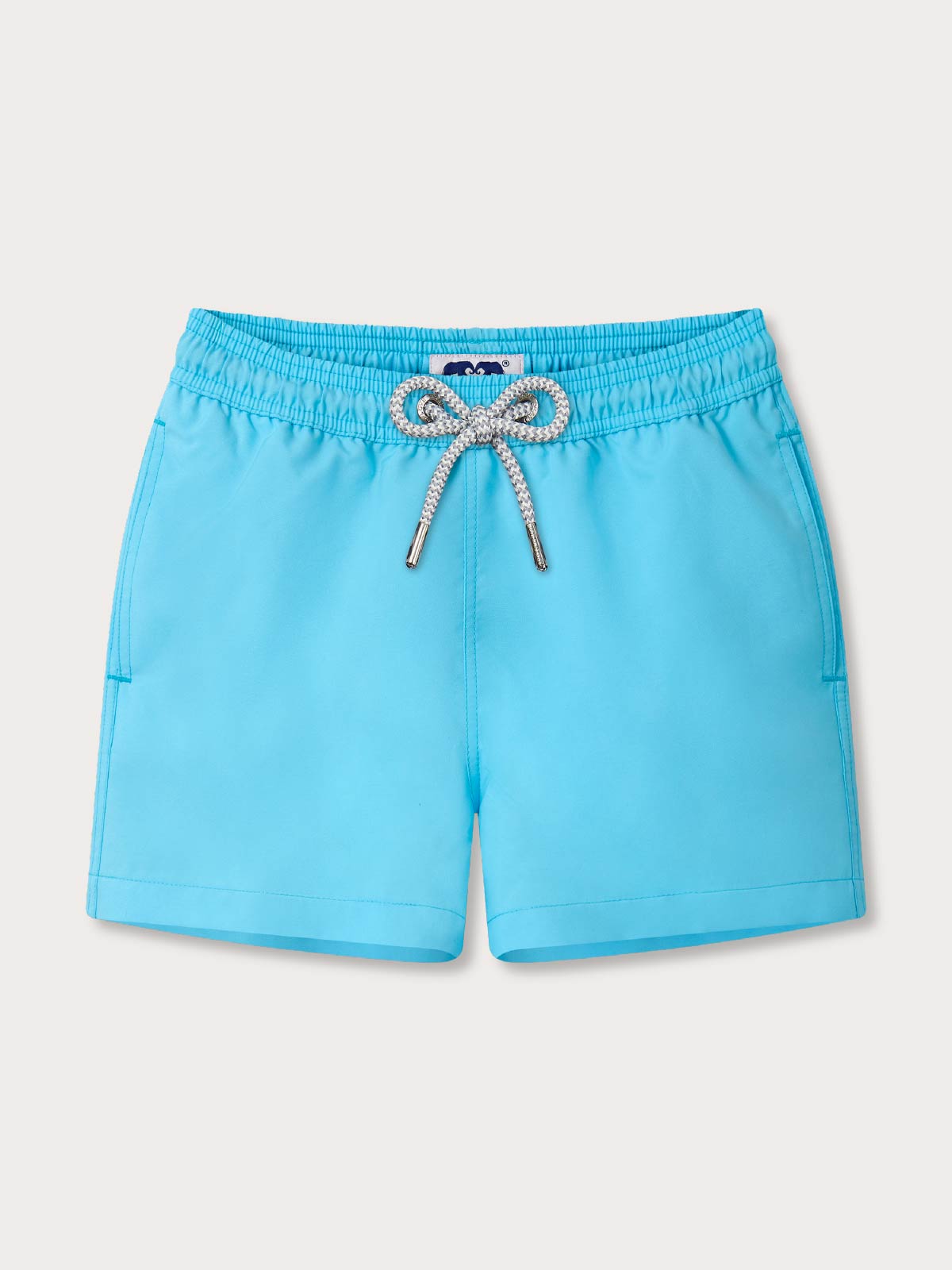 childrens blue swim shorts with a drawstring on a light grey background