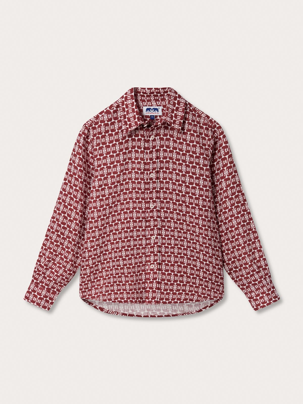 Boys Elephants of India Abaco Linen Shirt with long sleeves, featuring a dark burgundy elephant pattern on a crisp white background.