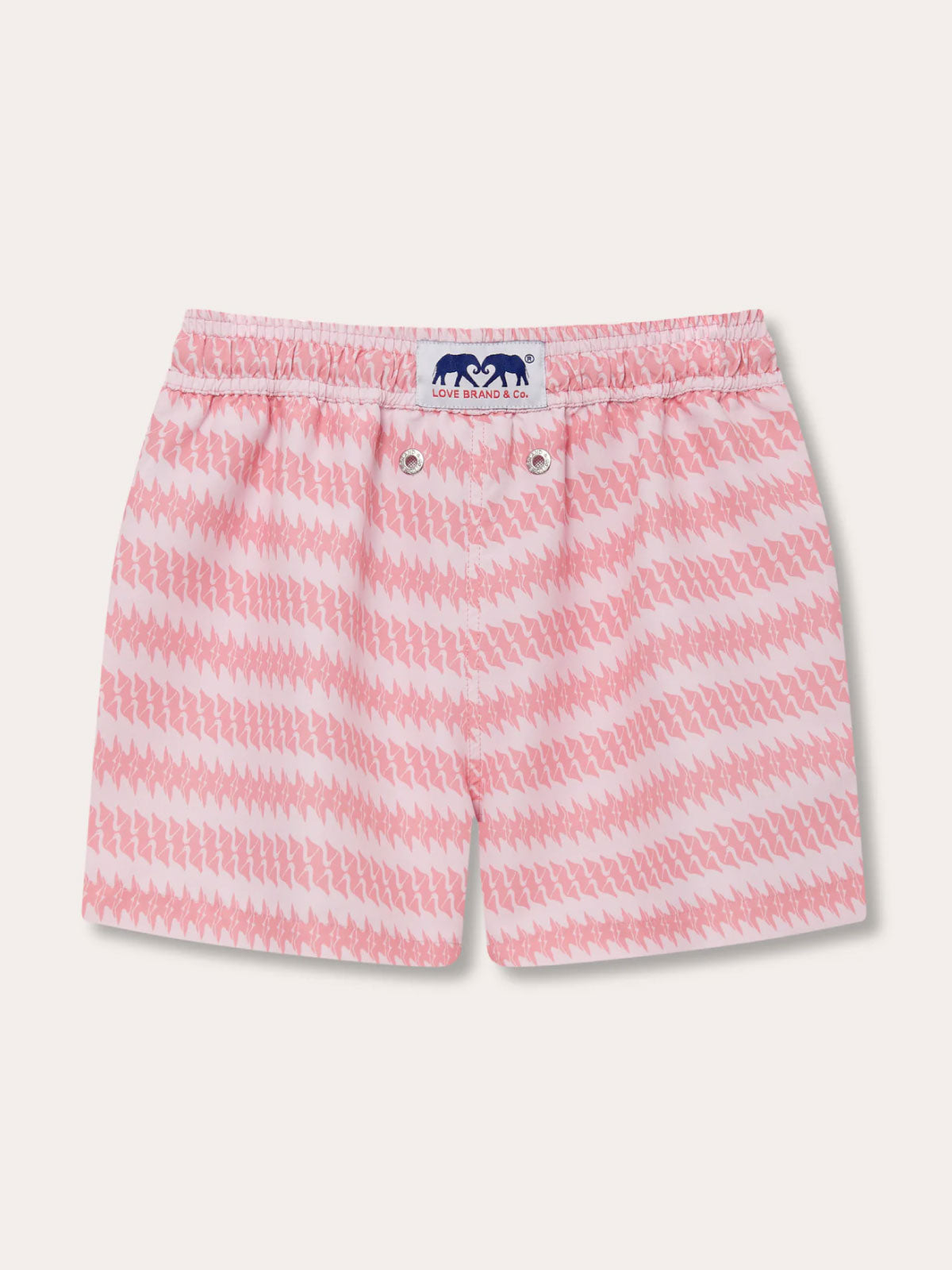 Boys Roseate Spoonbill Staniel Swim Shorts featuring a pink and white wading bird pattern, designed by Oliver Tomalin for The Boca Raton resort.