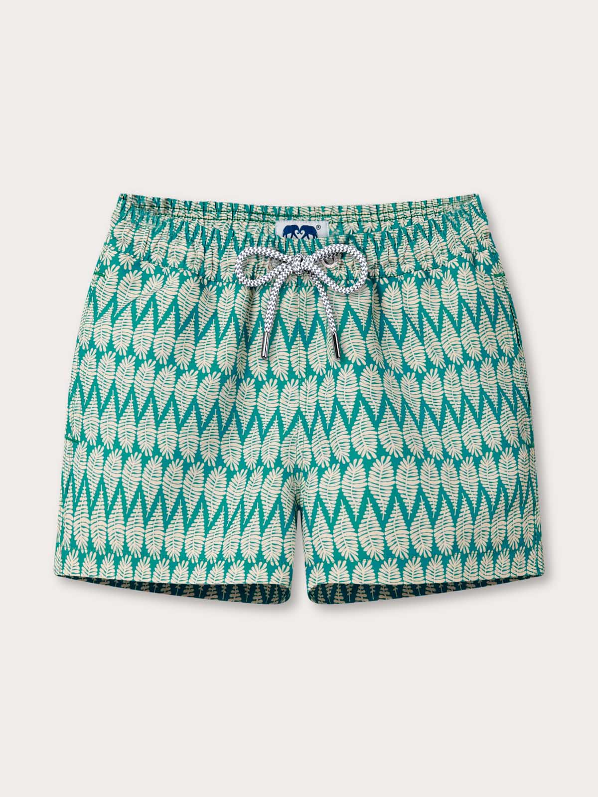 Front view of Boys Paradise Staniel Swim Shorts. Green and gold childrens swimming shorts with pockets.