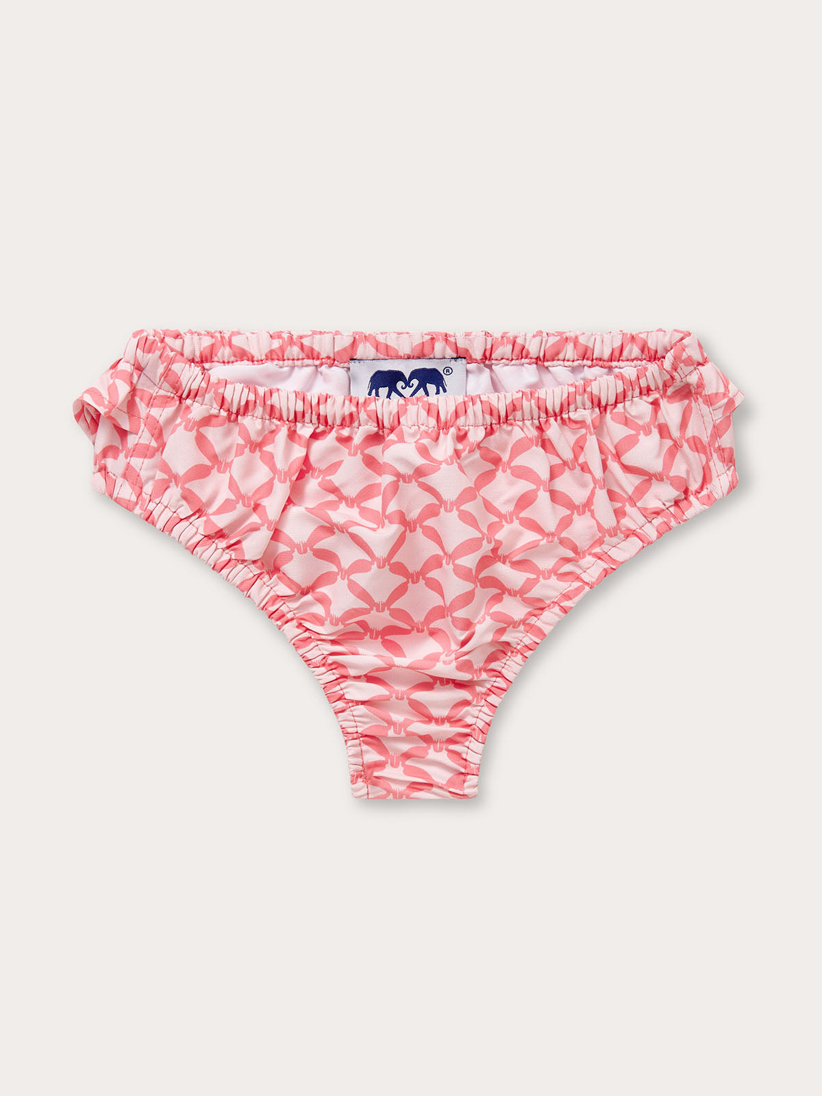 Girls Ray Rhythm Calabash baby bottoms featuring a unique diamond geometric print with grand manta rays, in light pink and watermelon hues, made from 100% recycled quick-dry fabric.