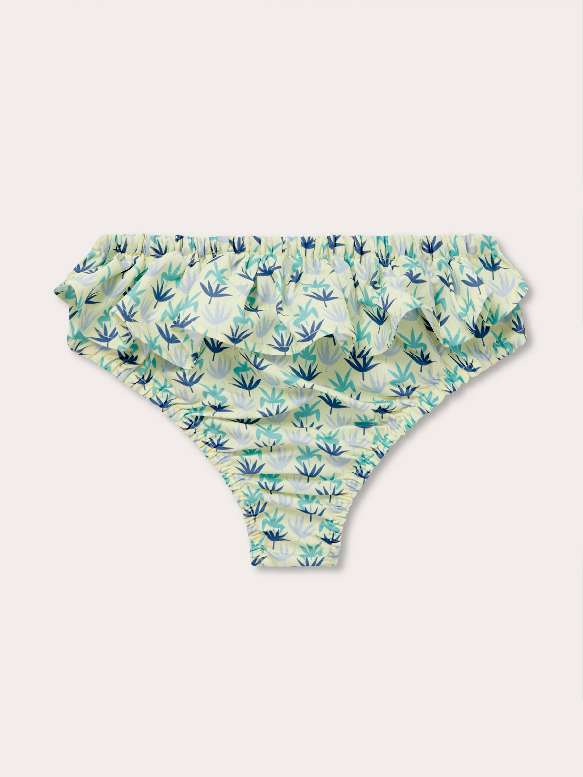 Girls Palm Sugar Calabash Baby Bottoms with vibrant tropical fan palm print on a limoncello yellow background.