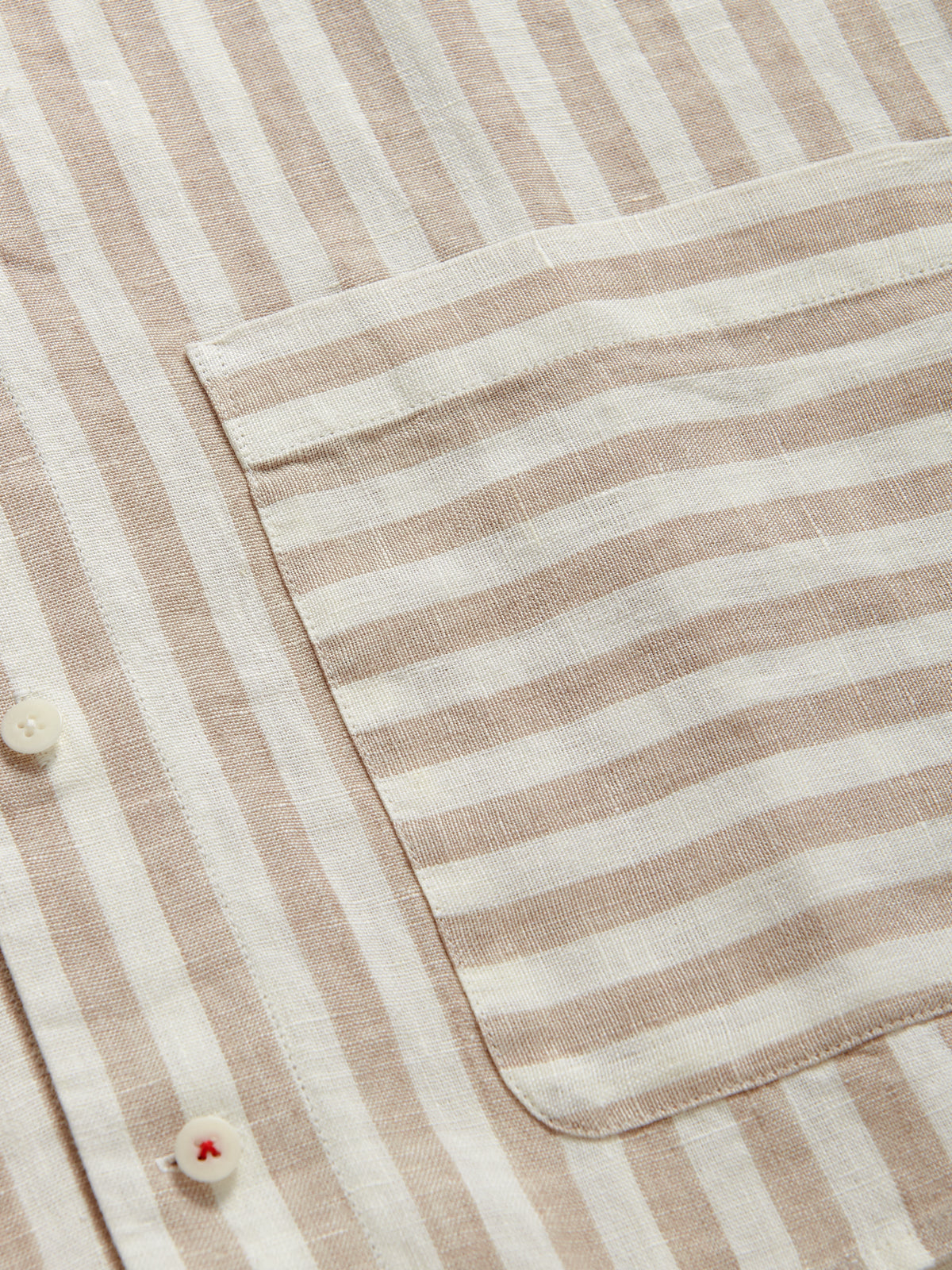 Close-up view of the striped pattern of Men's Coconut Stripe Goat Linen Shirt.
