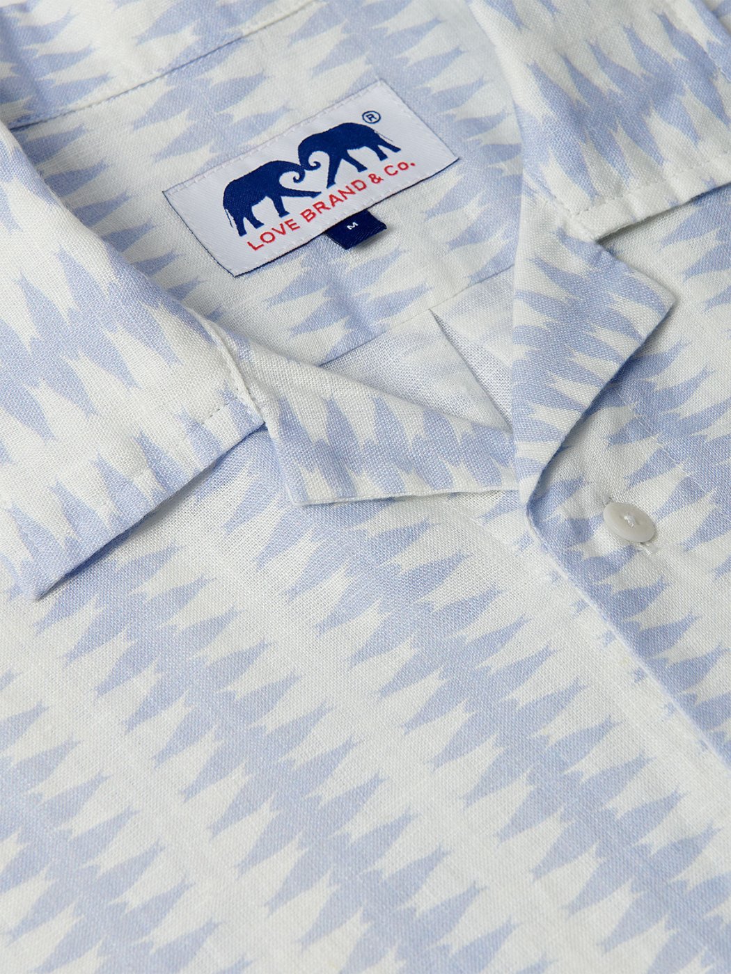 Dishy Fishy Arawak mens Linen Shirt with a chic blue and white fish print and a Love Brand & Co. label.