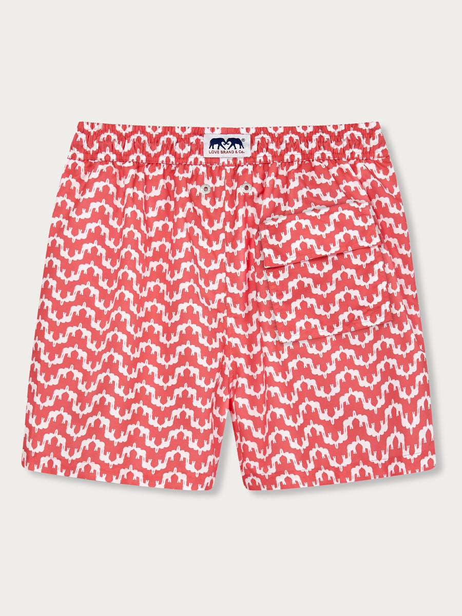 Boys Elephant Palace Coral Staniel Swim Shorts featuring a vibrant coral color with a white elephant palace-inspired print, designed for a playful and stylish swim experience.
