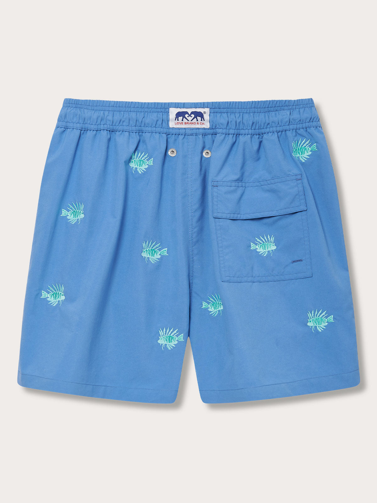 Men's Fish Fry Embroidered Staniel Swim Shorts in deep blue with an embroidered lionfish pattern. Patterned swim shorts featuring a back pocket and elastic waistband.