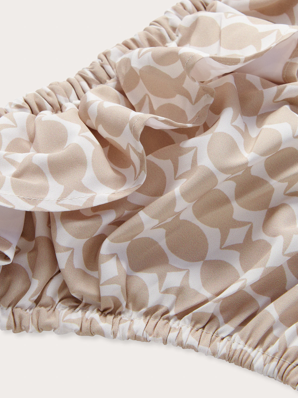 Side view of Pina Colada Calabash Girls Bikini Bottoms.