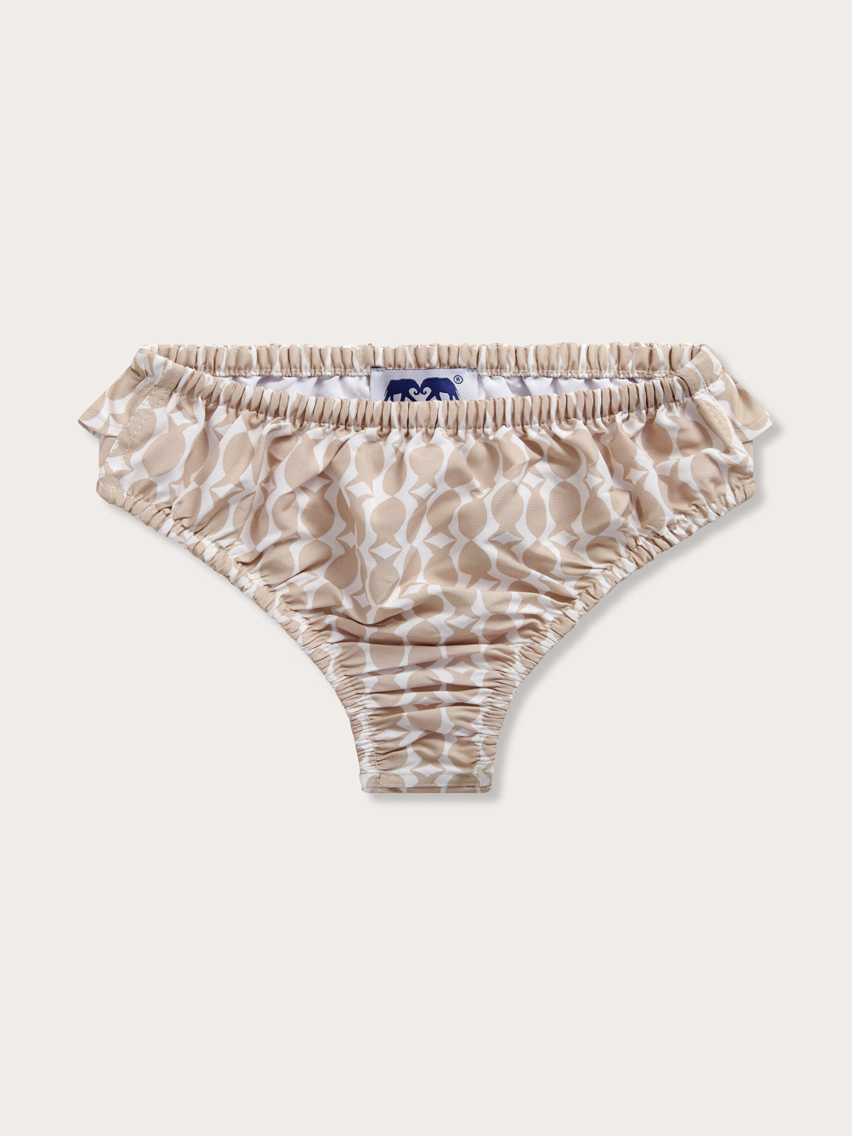 Front view of Girls Pina Colada Calabash Bikini Bottoms. Brown and white bikini bottoms with playful print.