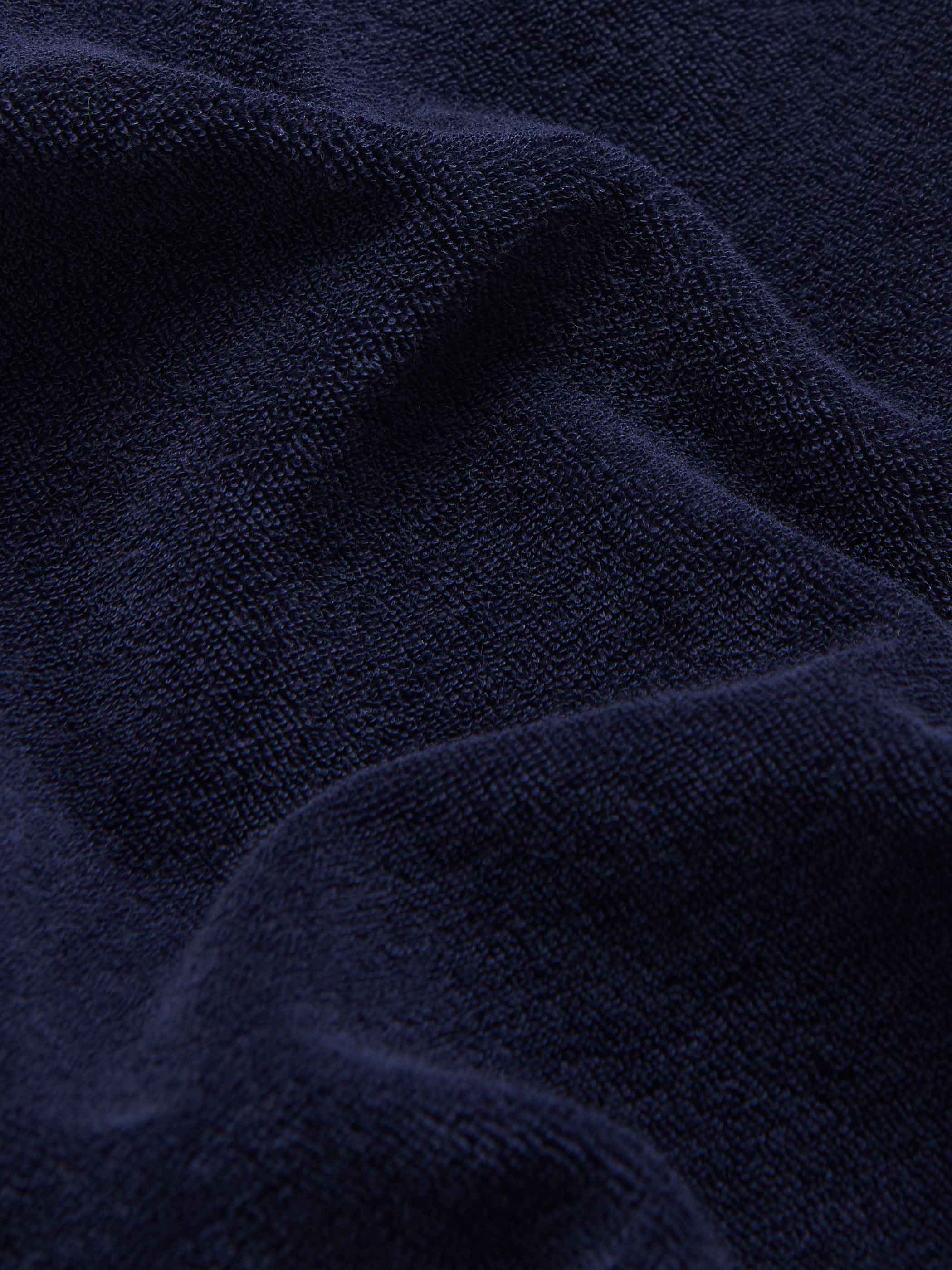 Detailed view of Kids Navy Blue Holmes Terry Shorts made from 100% cotton.