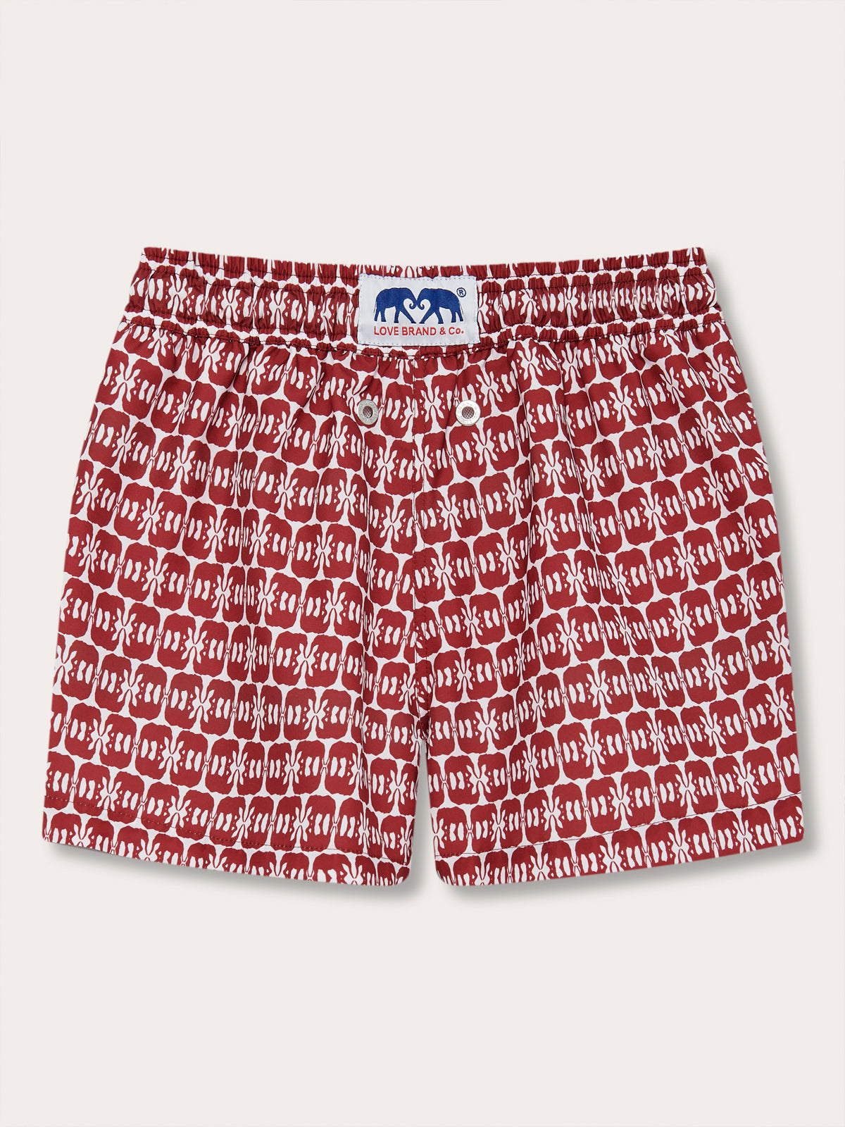 Boys Elephants of India Staniel Swim Shorts in deep burgundy with white elephant pattern, made from recycled and quick-dry material.