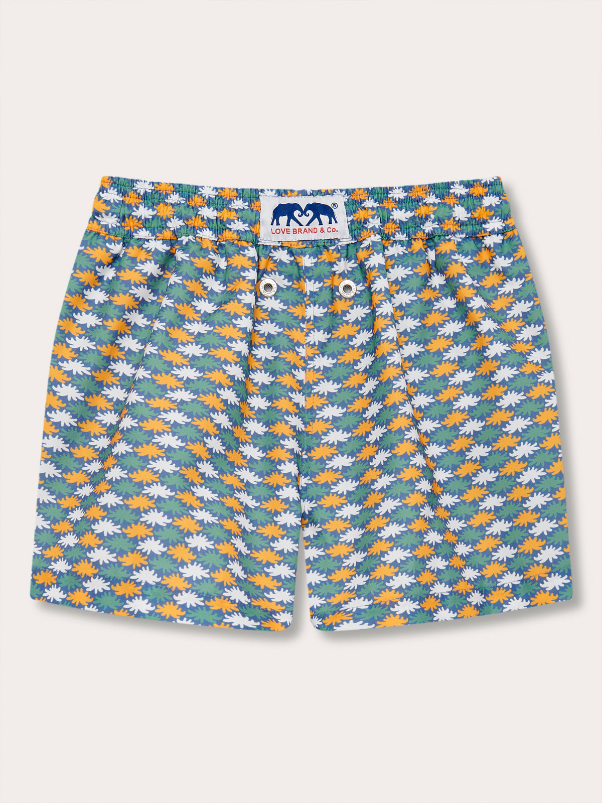 Boys Sea Flowers Staniel Swim Shorts featuring a unique floral pattern of sea anemones in yellow ochre, white, and green on a deep blue background, made from 100% recycled quick-dry fabric.