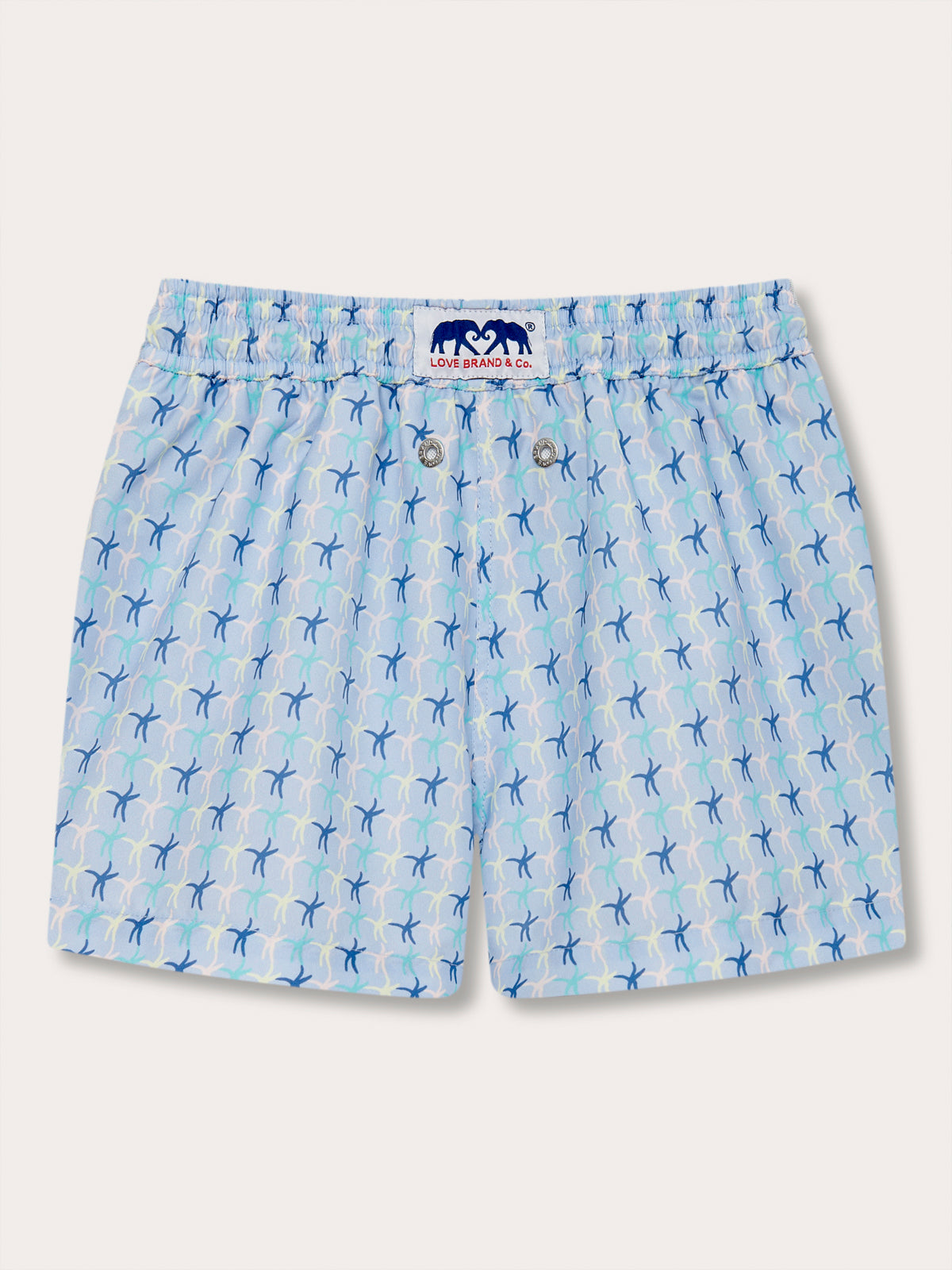 Boys quick-drying swim shorts with colorful starfish pattern in pastel pink, limoncello, cay green, and ocean blue.