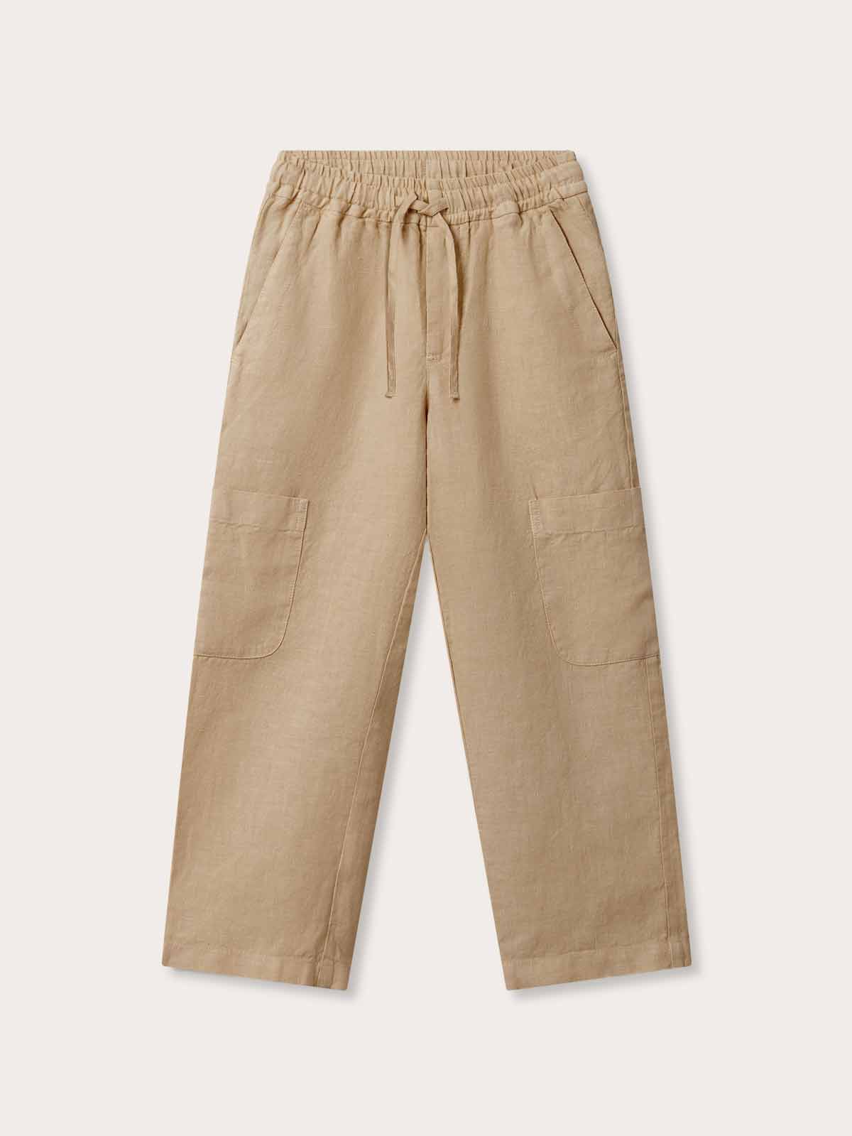 Front view of Kids Coconut Eleuthera Linen Trousers. Beige 100% linen trousers for kids.
