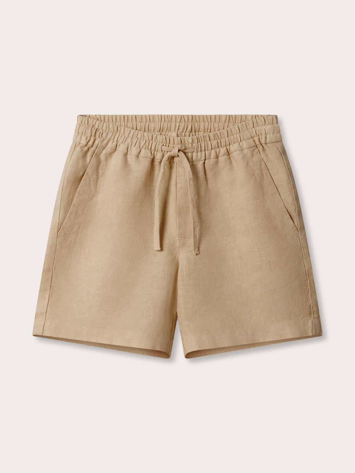 Front view of Kids Coconut Joulter Linen Shorts. Brown linen shorts for kids.