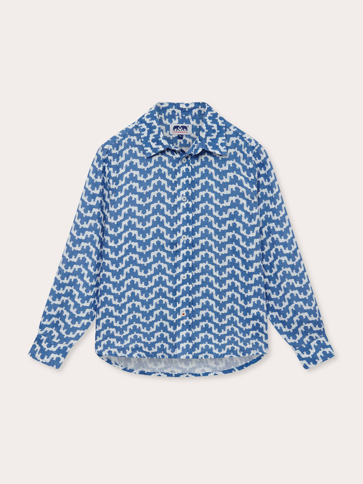 Front view of Kids Elephant Palace Blue Abaco Linen Shirt. White and blue patterned linen shirt for kids.