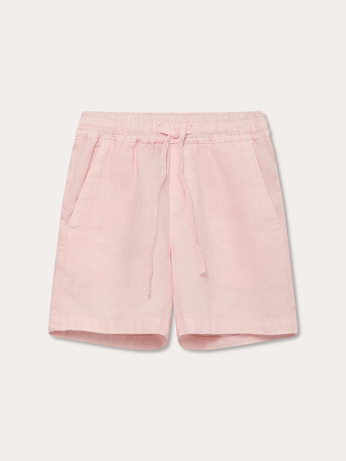 Front view of Kids Pastel Pink Joulter Linen Shorts. Pink linen shorts with pockets for kids.