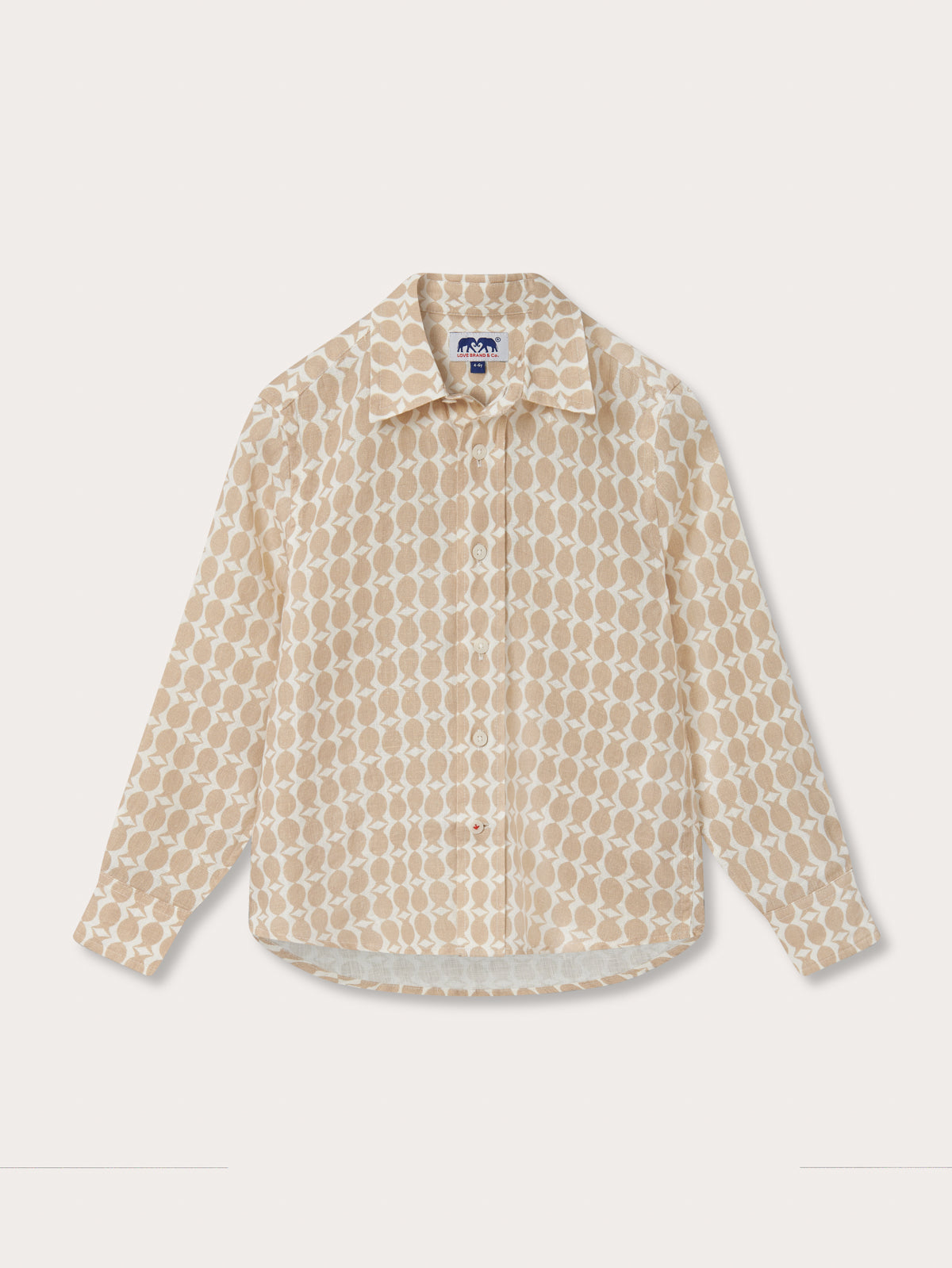 Front view of Kids Pina Colada Abaco Linen Shirt. Brown and white patterned long-sleeved kids shirt.