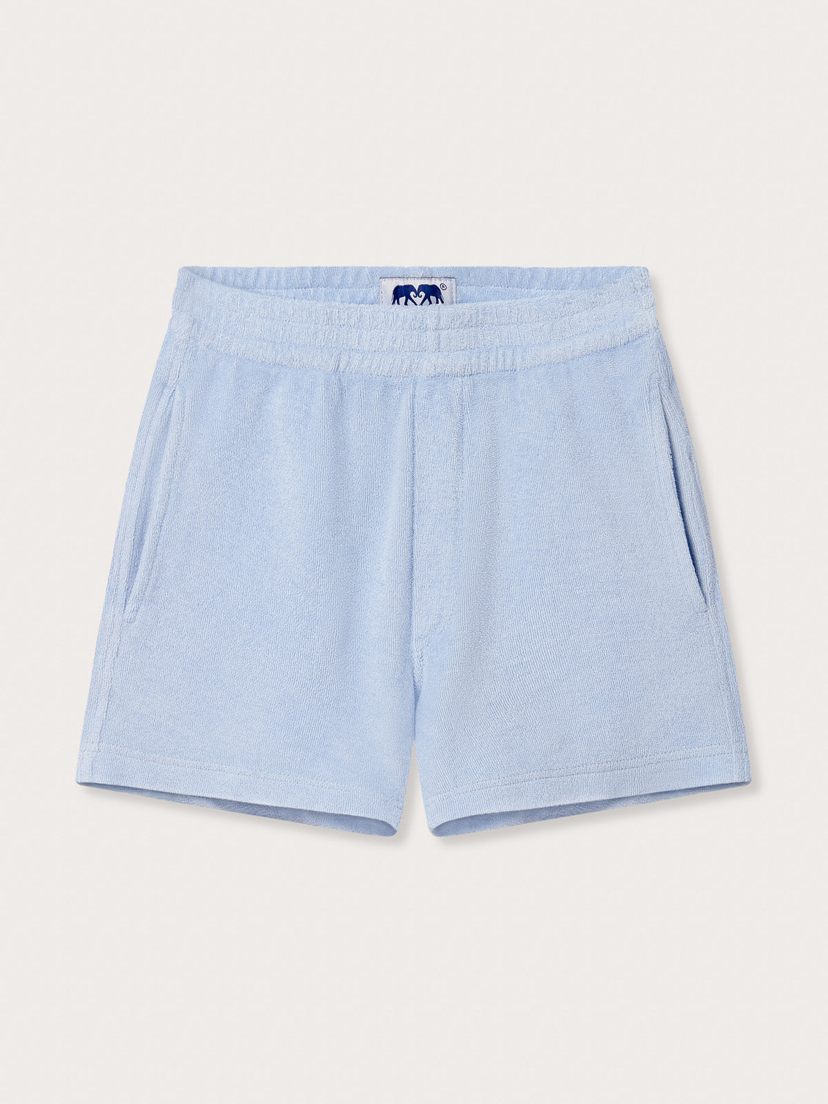 Front view of Kids Sky Blue Holmes Terry Shorts. Childrens terry towelling shorts with pockets.