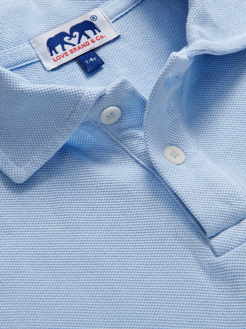 Kids Sky Blue Pensacola With Tab Polo Shirt detailed view. Kids blue polo shirt.