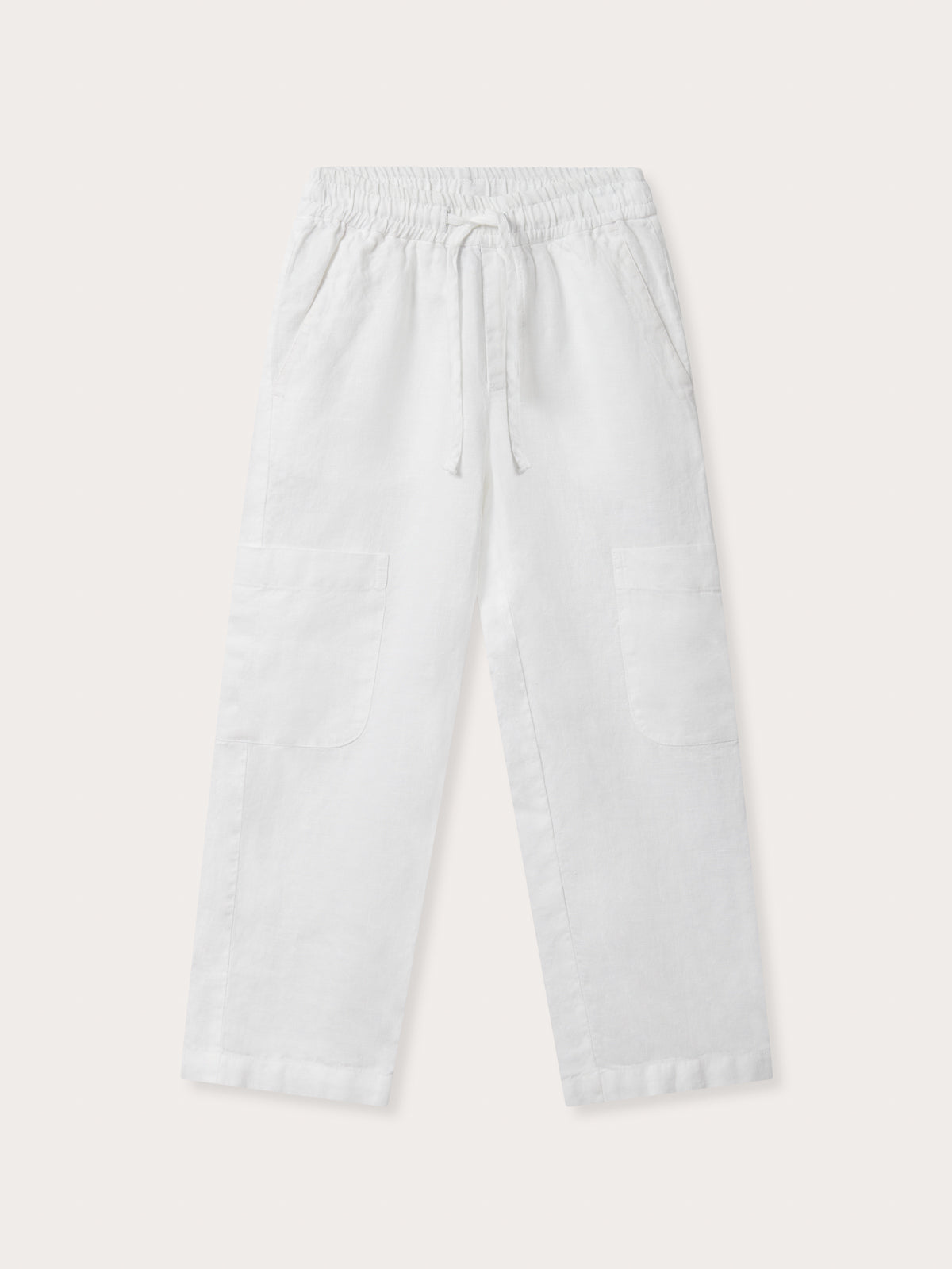 Front view of Kids White Eleuthera Linen Trousers. Linen pants for kids.
