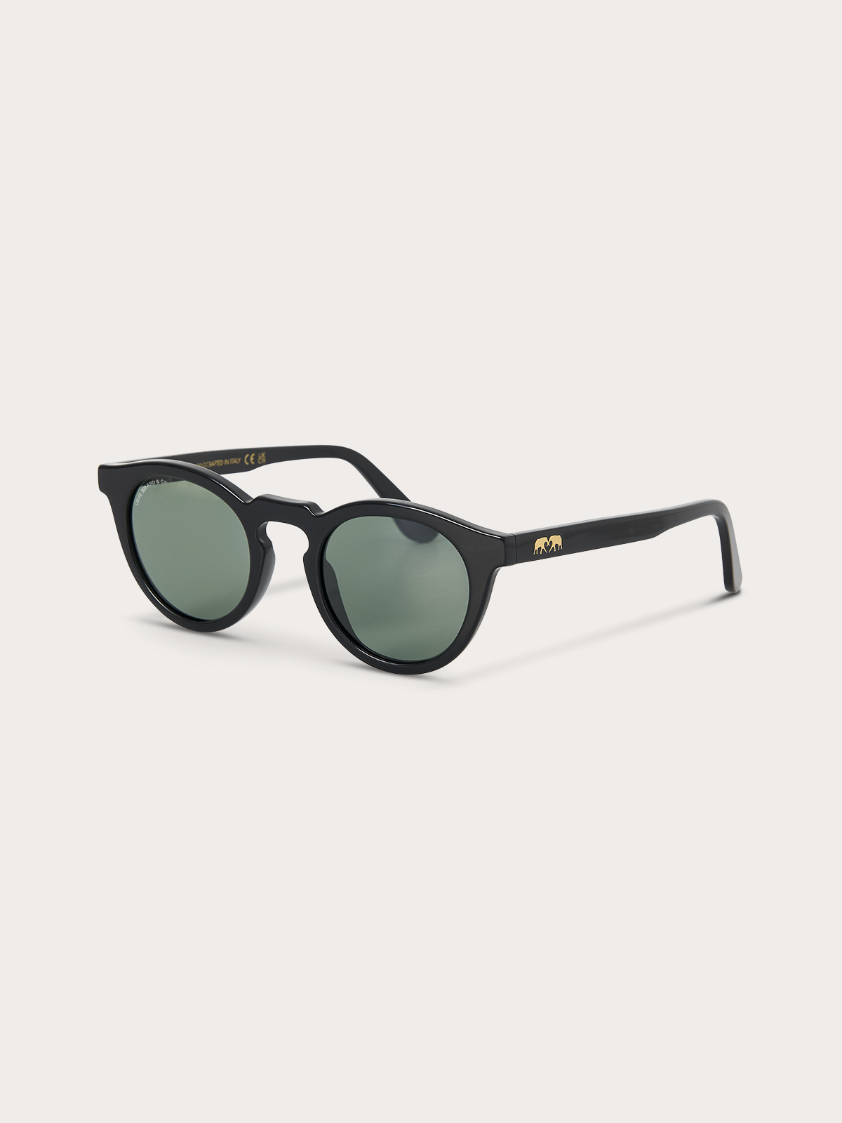 Black sunglasses with a gold logo on a white background