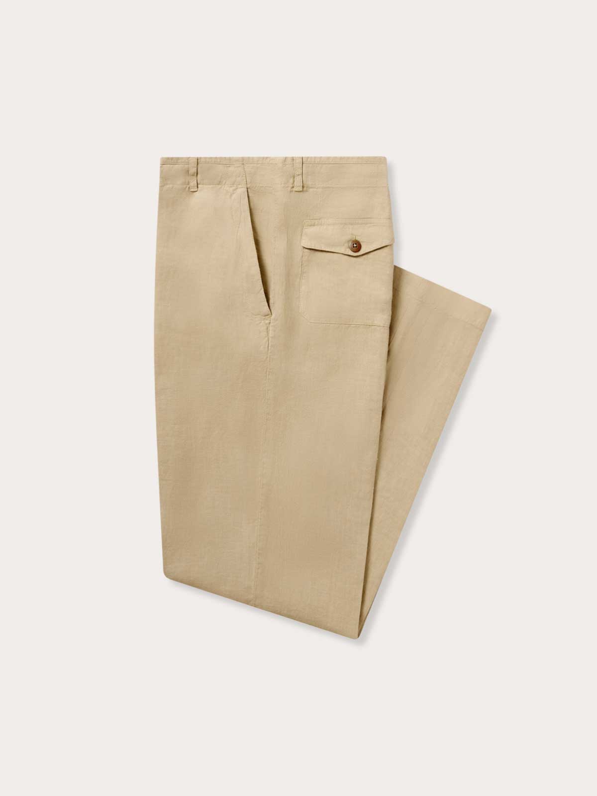 Side view of Men's Coconut Randall Linen Trousers. Beige linen pants with 4 pockets.