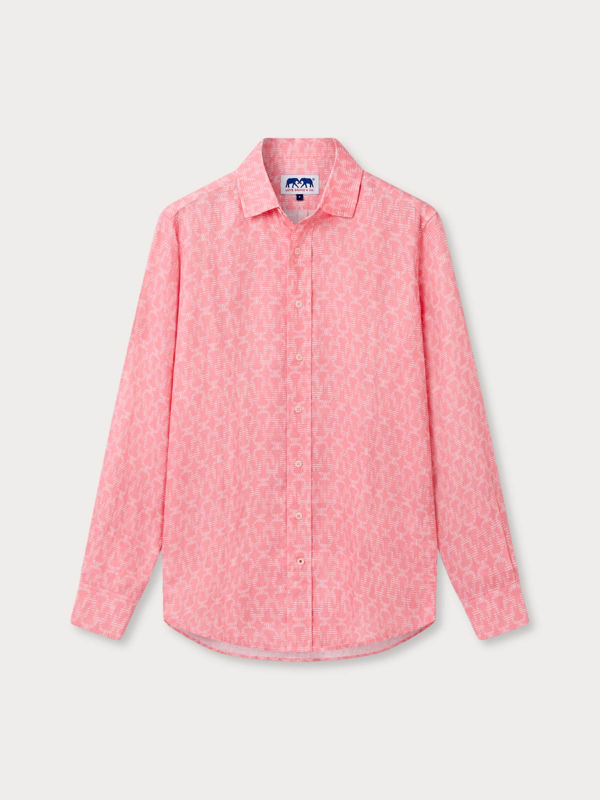 Pink patterned shirt with long sleeves on a light grey background.