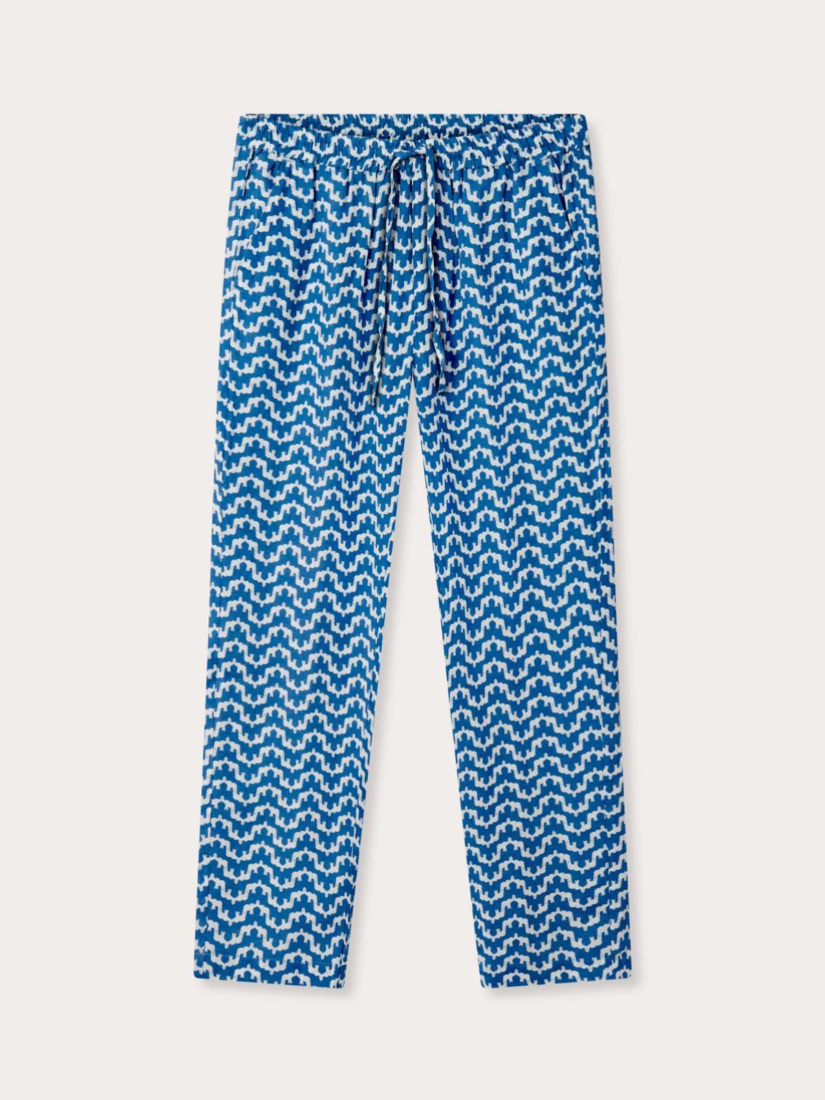 Front view of wide leg mens linen trousers featuring drawstring tie and elastic waist. Blue linen pants mens with Elephant Palace design. Old money menswear.