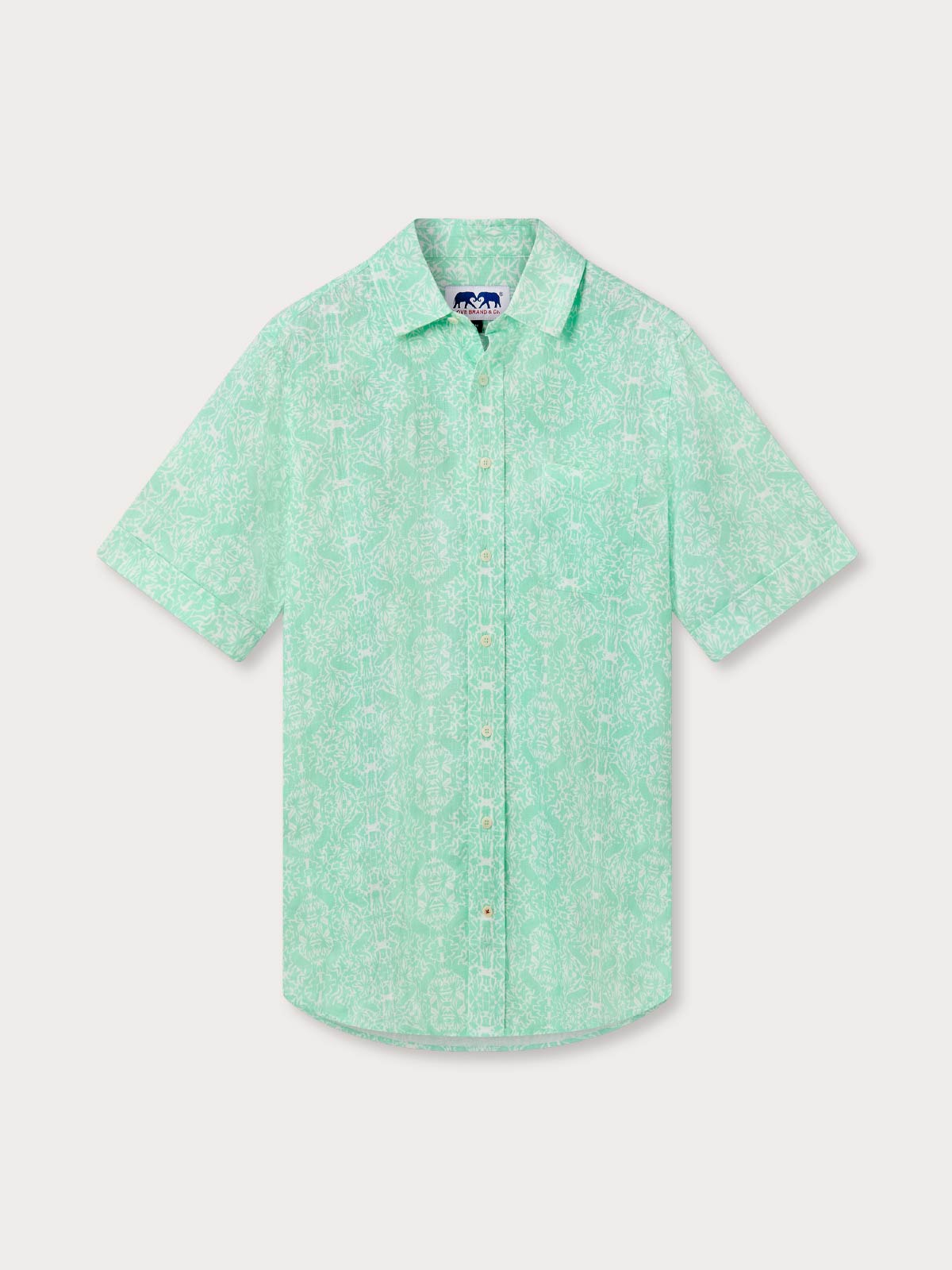 Front view of Men's Island Iguana Manjack Linen Shirt. Green patterned shirt on a light grey background