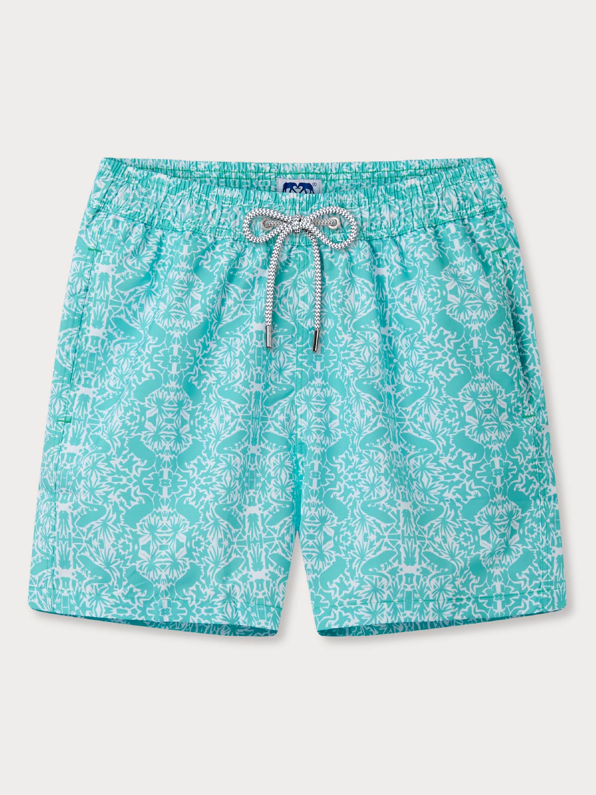 Teal patterned swim shorts with a drawstring on a light gray background