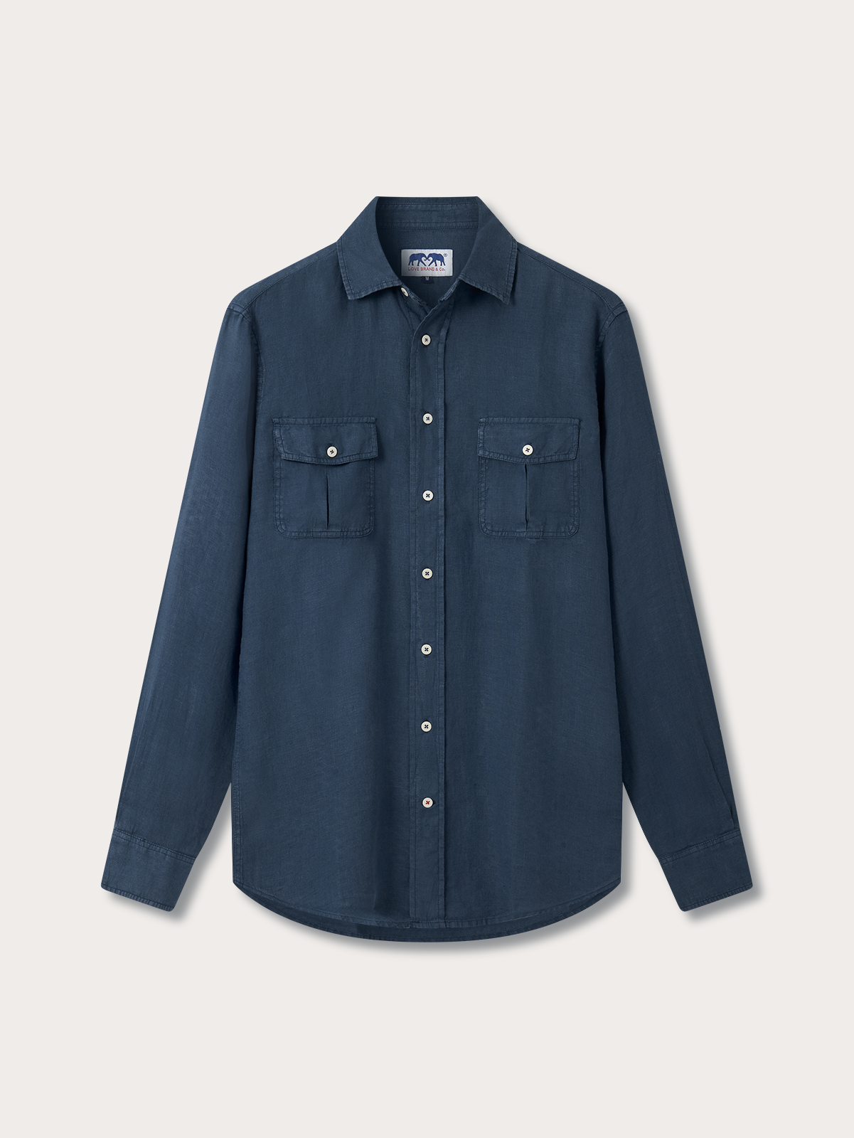 Front view of blue hemp shirt with 2 breast pockets and a button-up design