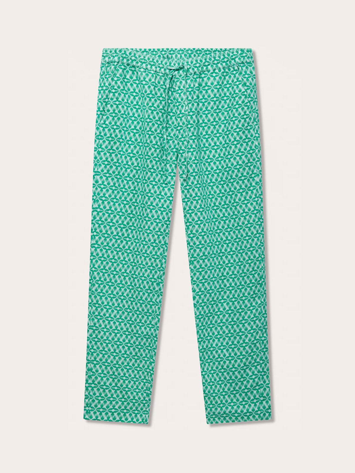 Front view of Men's Palm Eagle Eleuthera Linen Trousers. Green linen trousers mens with a pattern inspired by the Lesser Fish Eagle and tropical palms.