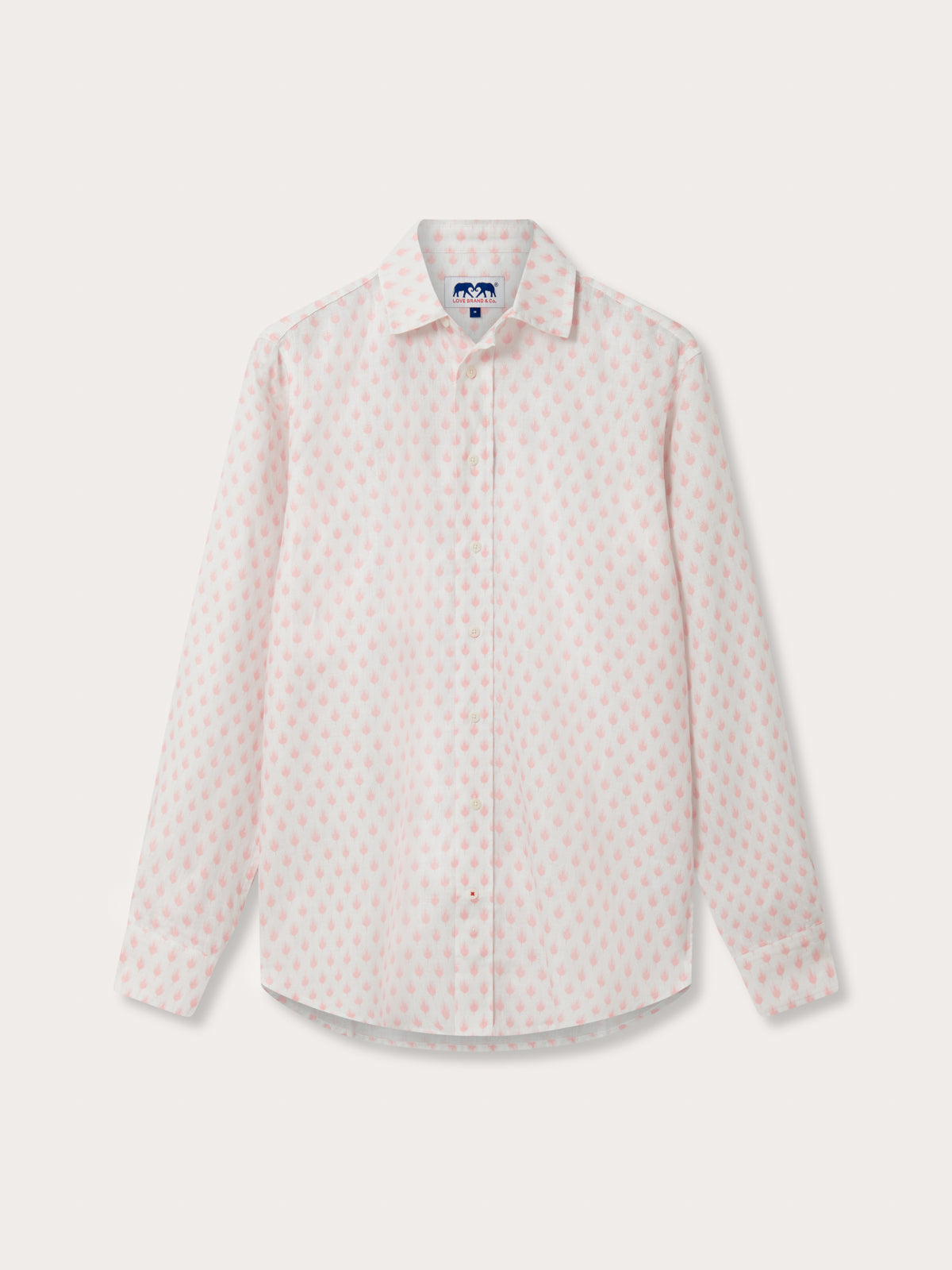 Pink patterned shirt on a light grey background