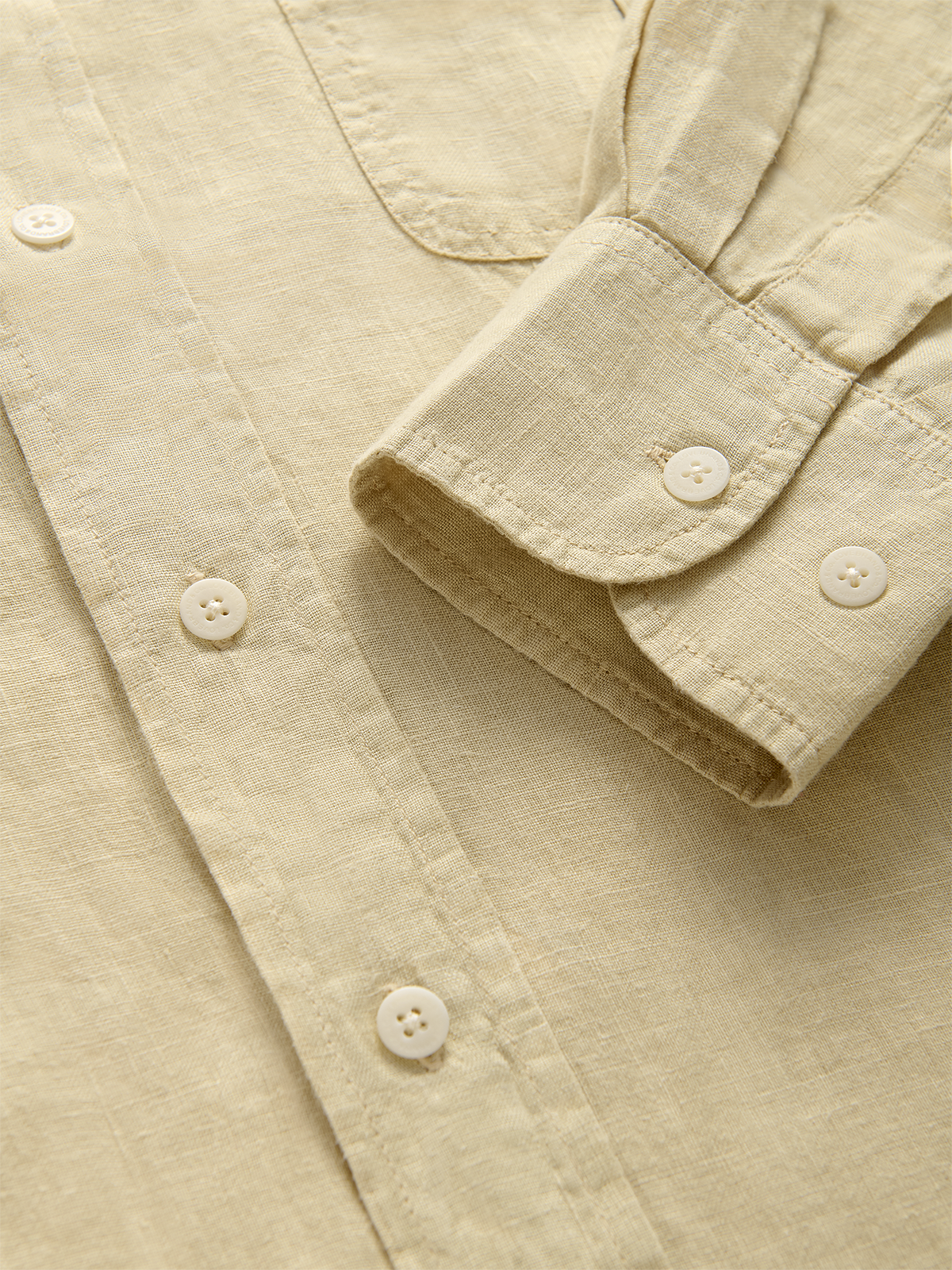 cuff view of a beige hemp shirt