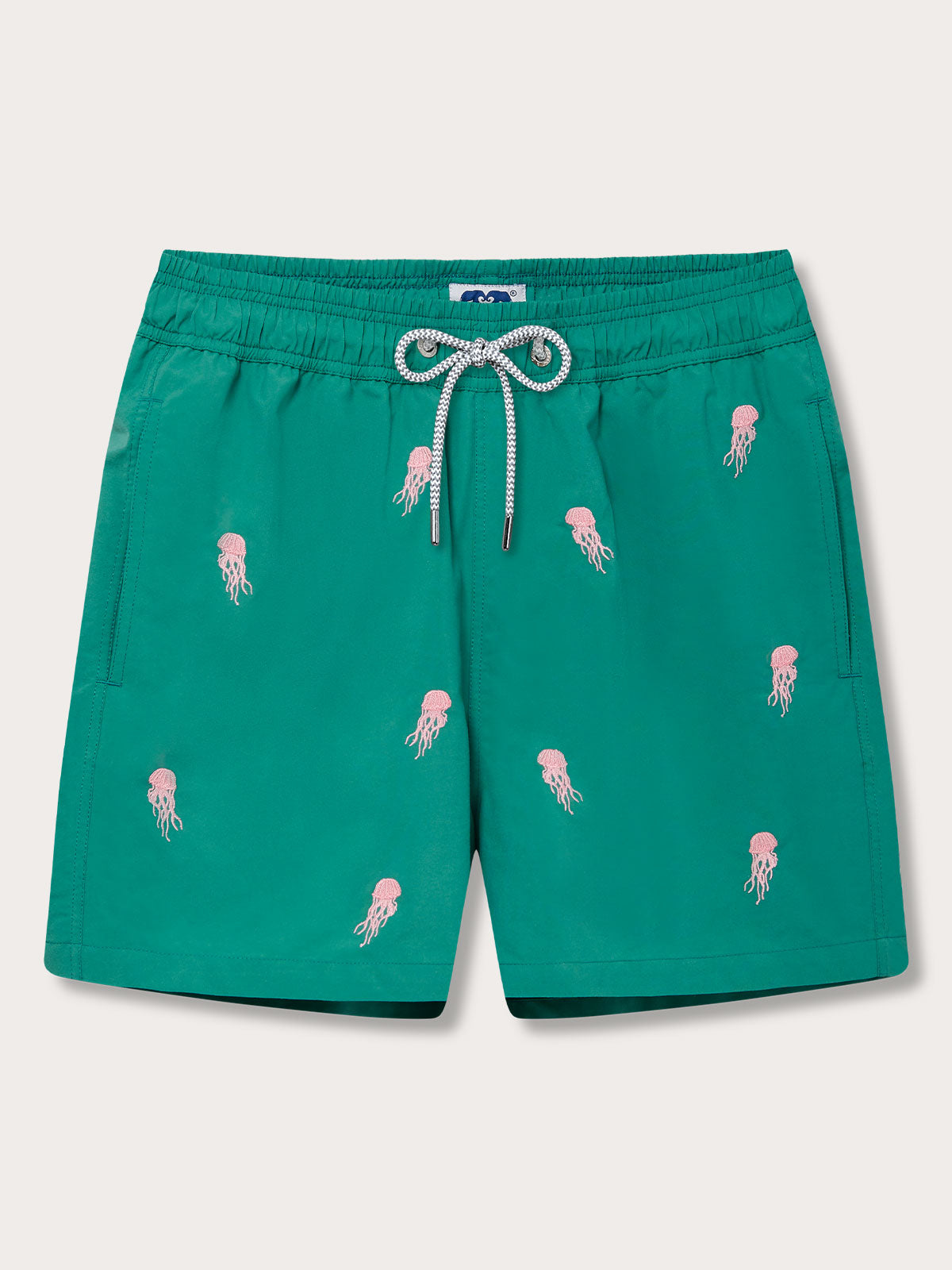 Men's Smack Attack Embroidered Staniel Swim Shorts in Palm Green with pink jellyfish motif, featuring drawstring closure and side pockets, made from 100% recycled polyester.