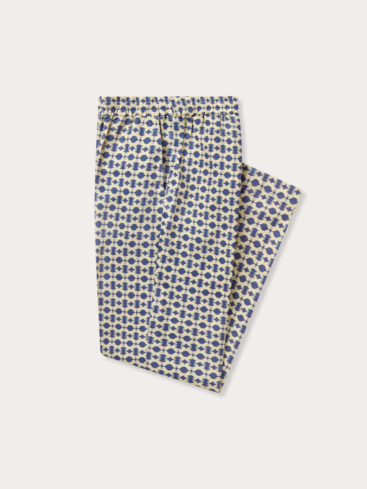 Side view of Men's Eye of the Tiger Eleuthera Linen Trousers showing blue and beige tiger print.