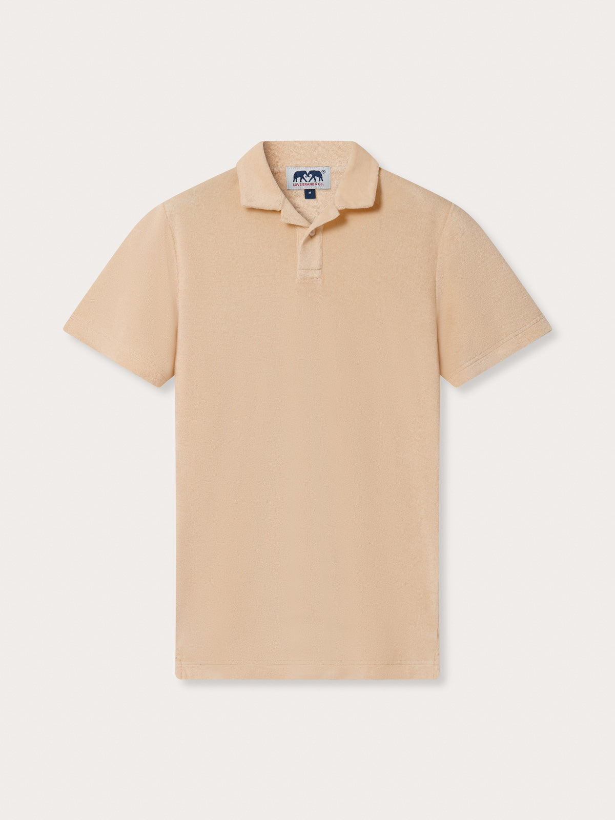 Men's Coconut Powell Terry Polo. Brown terry towelling polo shirt crafted from 100% cotton. Short-sleeved polo shirt.