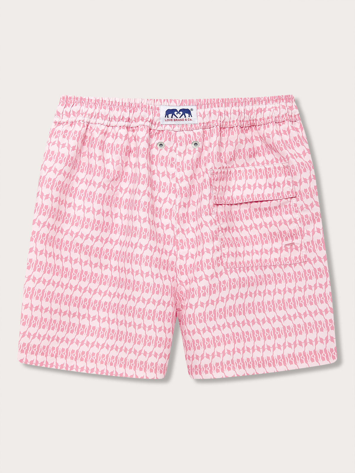 Men's pink swim shorts featuring a camel mirage pattern designed in tribute to Cop28 in Dubai 2023. Patterned swim shorts highlighting UAE's environmental efforts.
