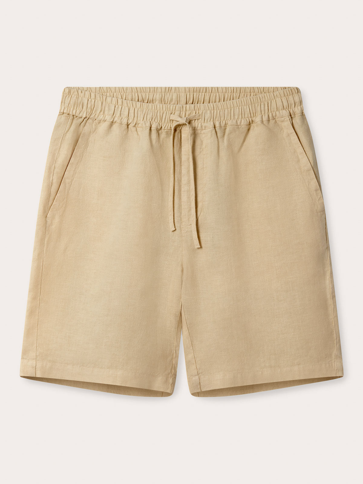 Front view of Men's Coconut Joulter Linen Shorts. Classic brown shorts with 2 front pockets and a drawstring waist in a relaxed fit.