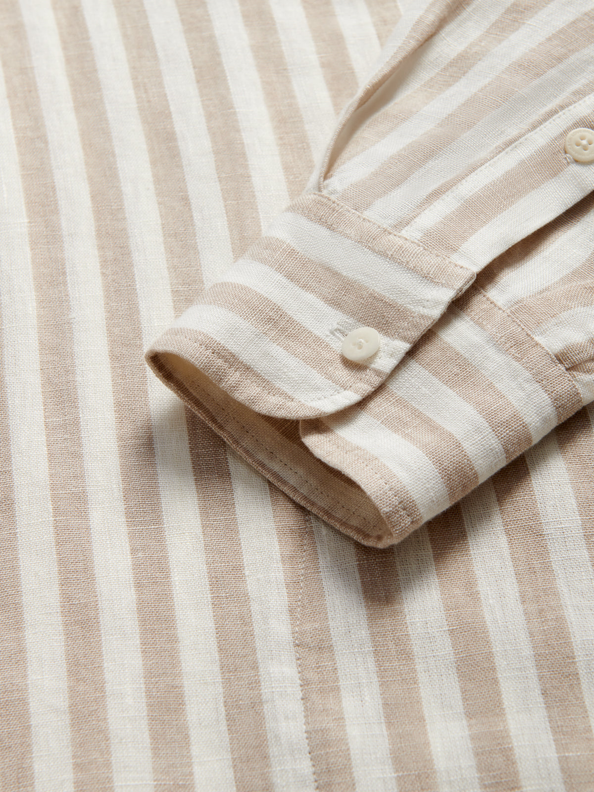Close-up view of Men's Coconut Stripe Windermere Linen Hoodie cuff.