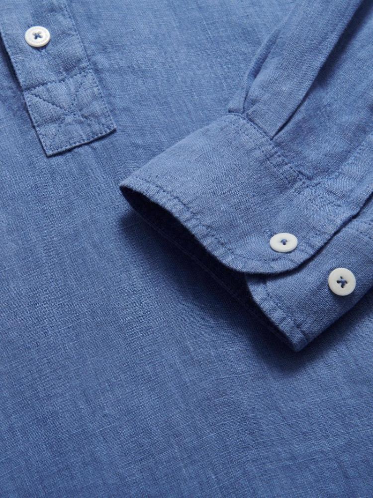 Close-up of the Men's Deep Blue Hoffman Linen Shirt cuff and half-button detail. Old money shirts made from 100% linen.