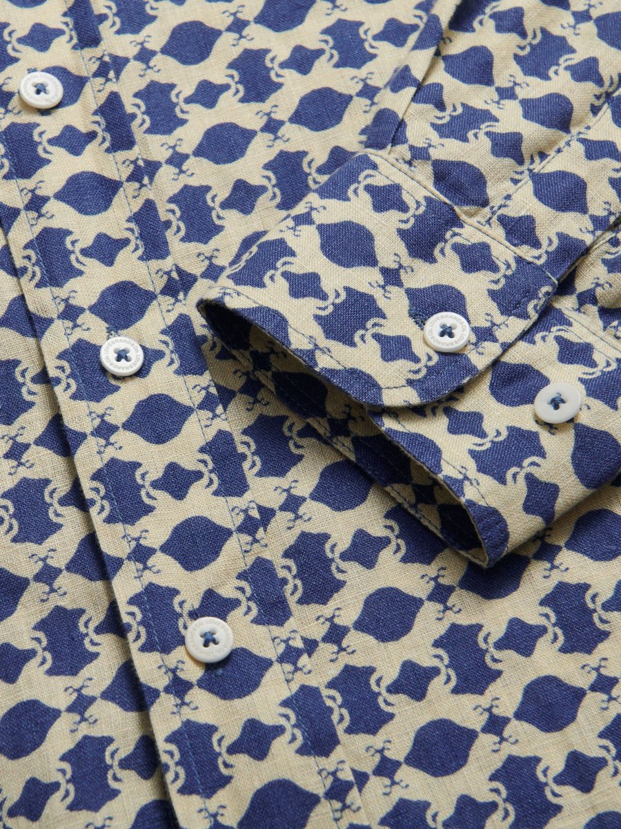 Abaco Eye of the Tiger mens Linen Shirt. Close-up view of our blue and stone geometric tiger print design.