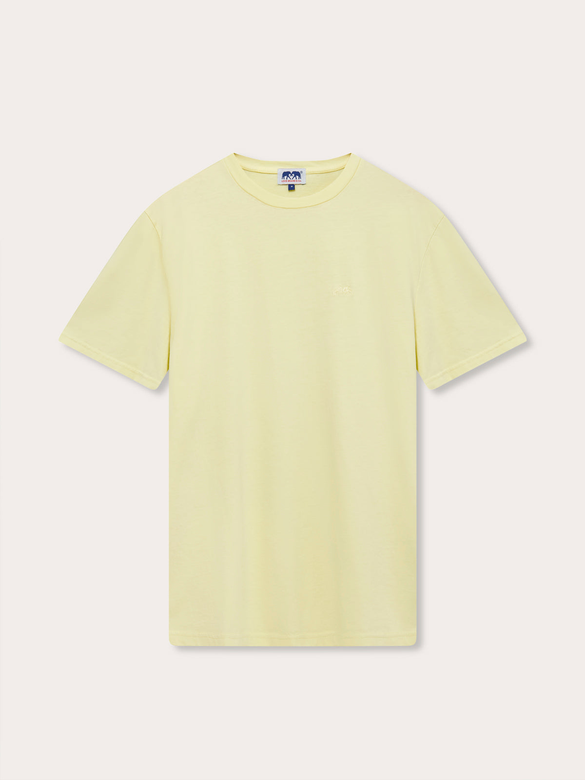 Men’s Limoncello Lockhart T-Shirt in organic cotton. Limoncello t shirt displayed in light yellow color, short-sleeved, round neck.