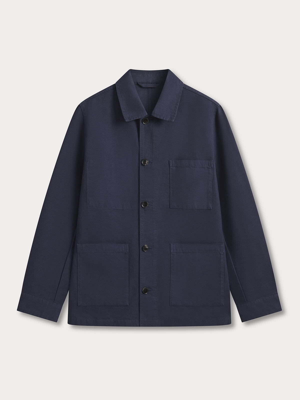 A dark navy blue utility jacket with a pointed collar, button-up front, and four front pockets, displayed flat against a light off-white background.