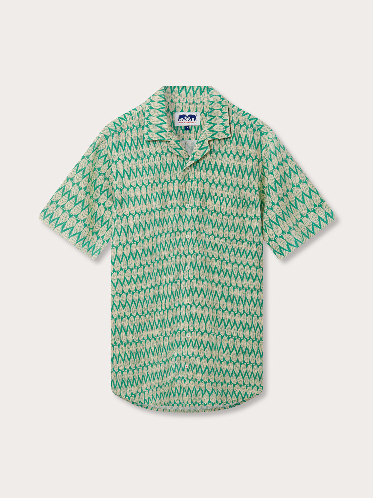 Front view of Men's Paradise Arawak Linen Shirt. Green men's shirt with short sleeves and a leaf pattern.