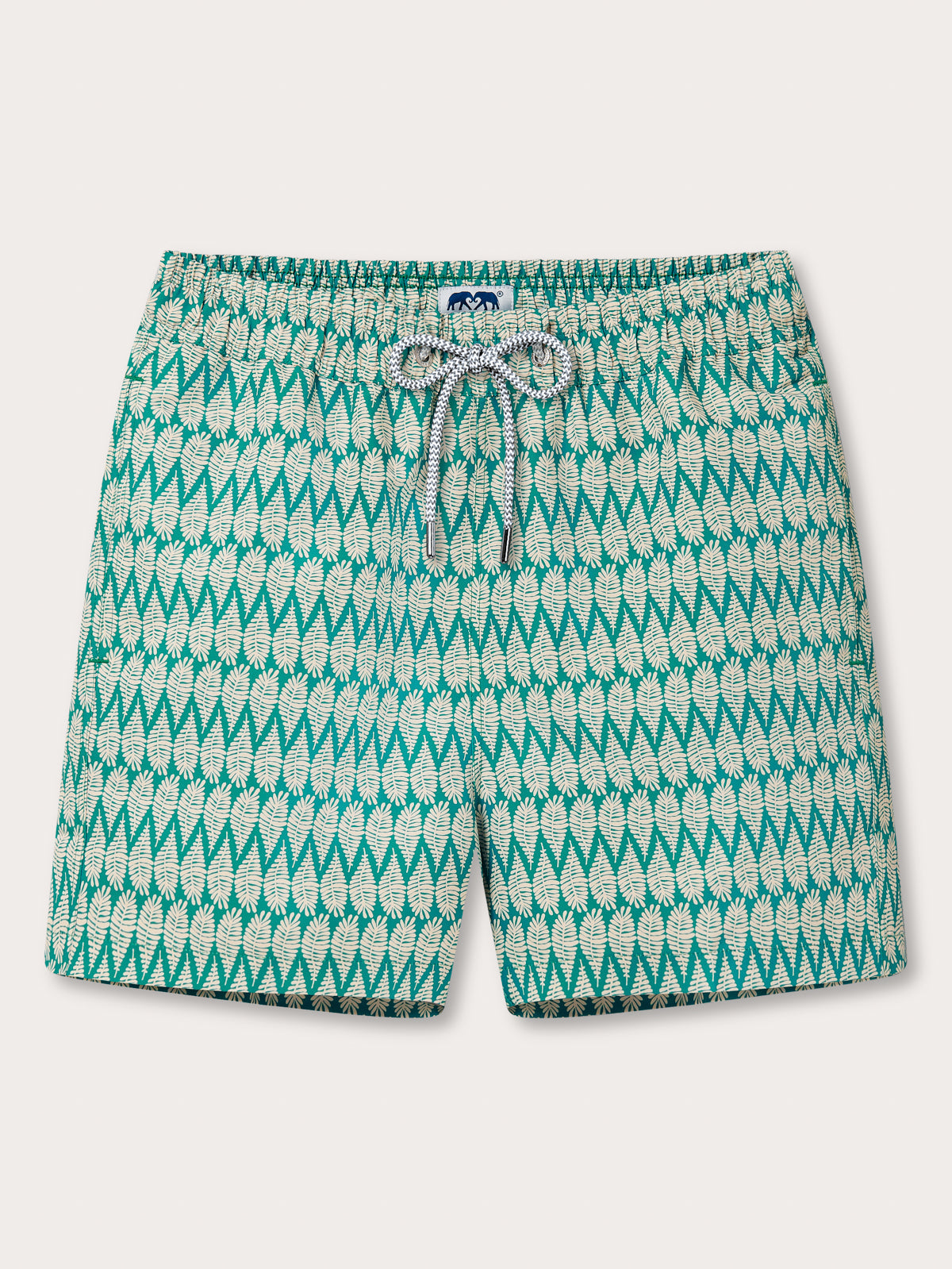 Front view of Men's Paradise Staniel Swim Shorts. Men's swimwear in green featuring a tropical leaf pattern.
