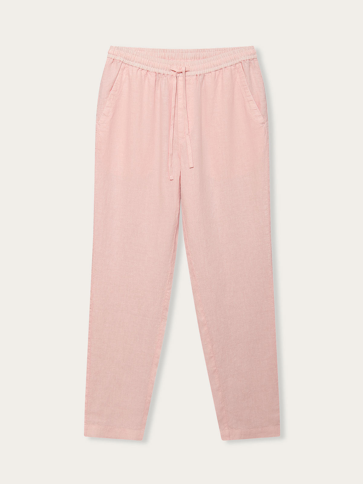 Men's Pastel Pink Eleuthera Linen Trousers, front view. Mens linen trousers showing 2 front pockets, drawstring waist and pastel pink colour. in a relaxed fit perfect for old money styling.